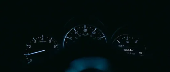 dashboard gauges at night