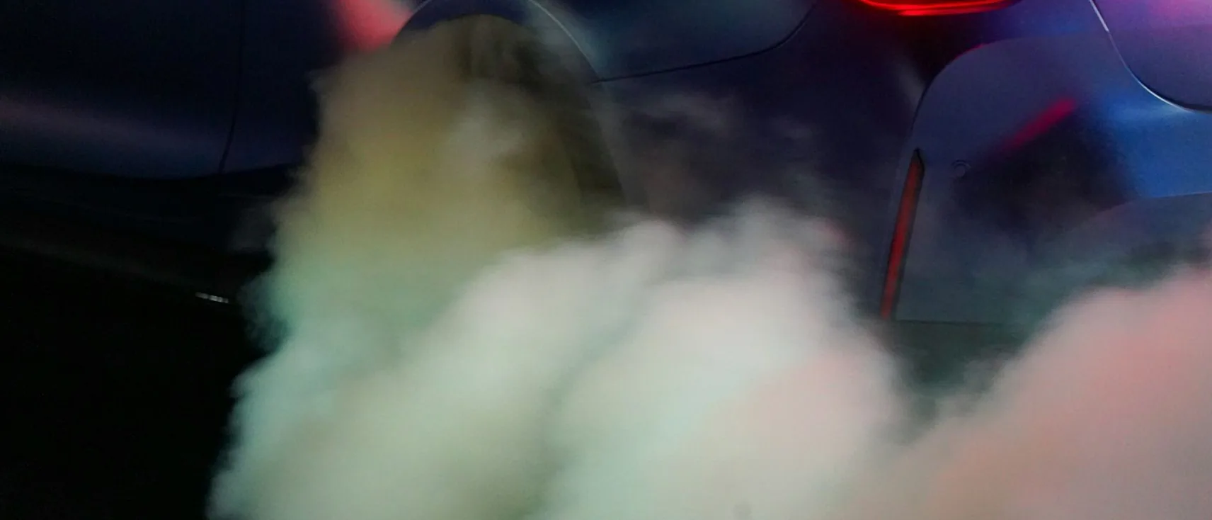 exhaust smoke or a diesel tailpipe — header, wide