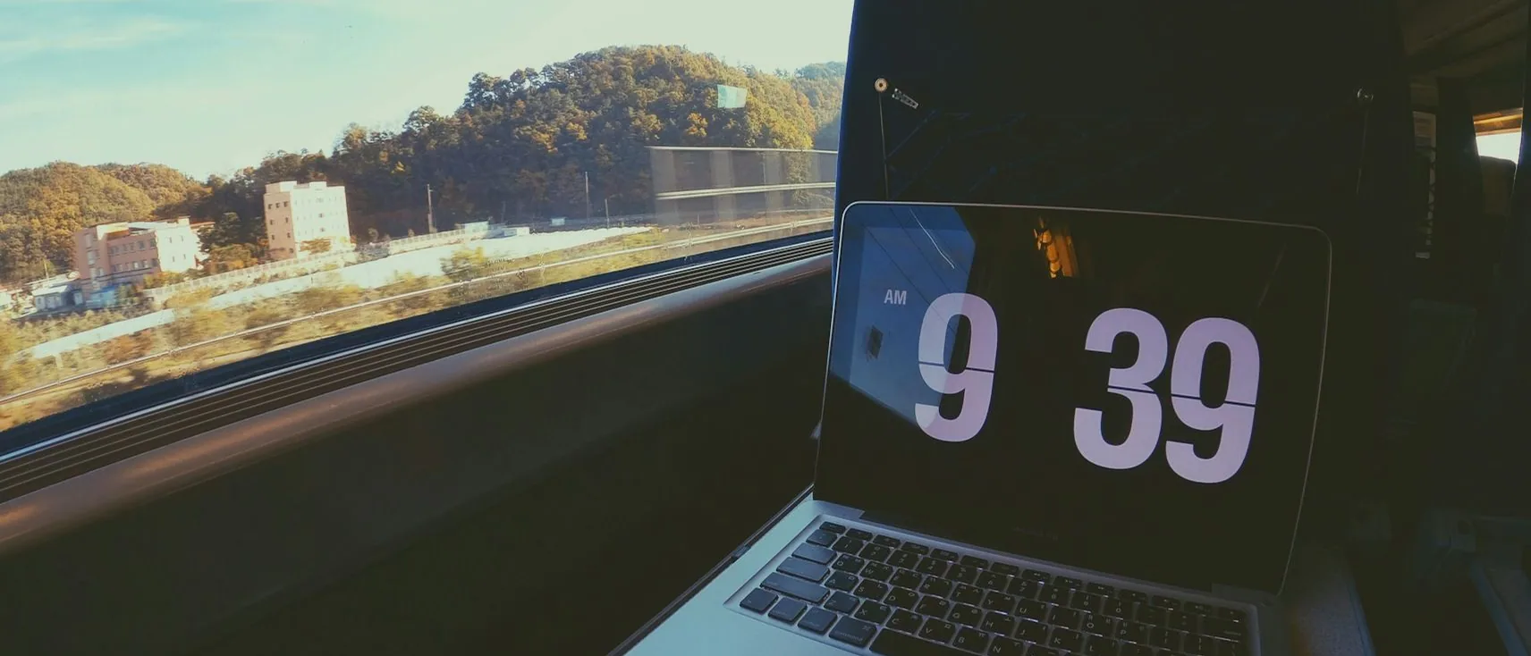 a laptop in a car — in-article, wide