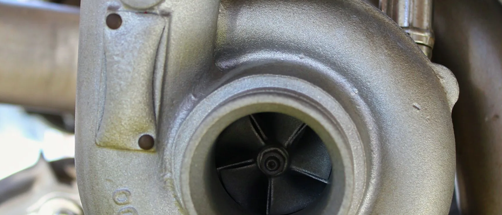 a turbocharger, close — in-article, wide