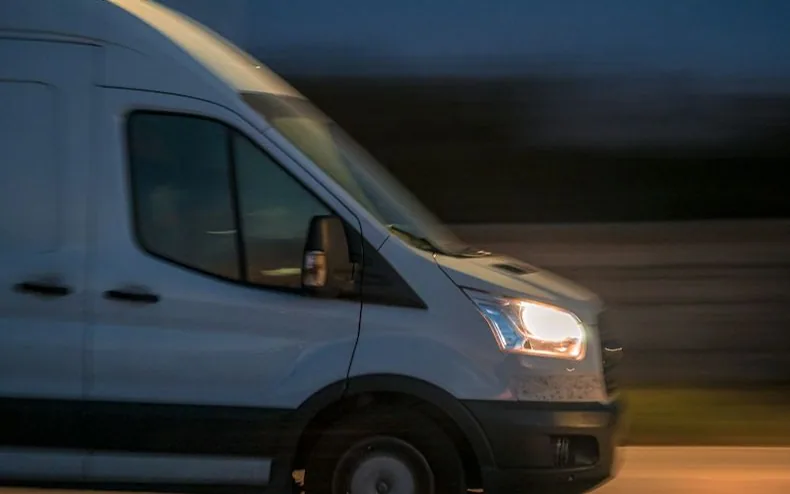 a van on the move — article card