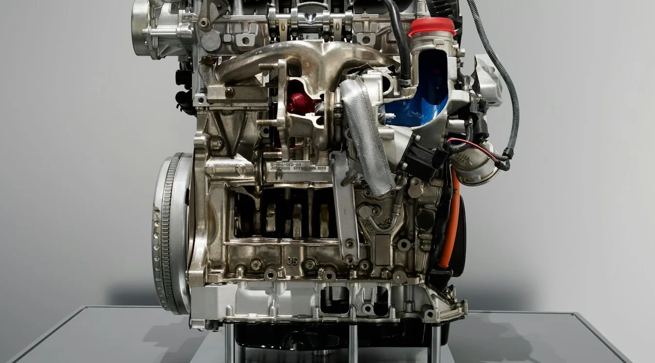 an engine on a stand — article card