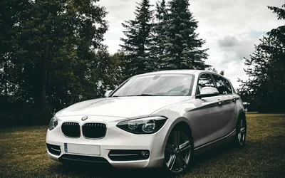 BMW M140i — the named car, side or rear three-quarter