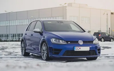 VW Golf R DSG — the named car, side or rear three-quarter